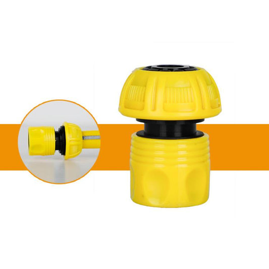 Yellow hose connector adapter with black seal ring and ribbed body, front view