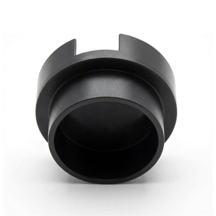Black sofa cup holder adapter insert with curved outer tabs around the opening