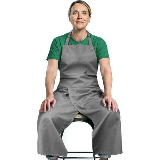 Grey split-leg pottery apron with front pocket, adjustable straps, and waist loops