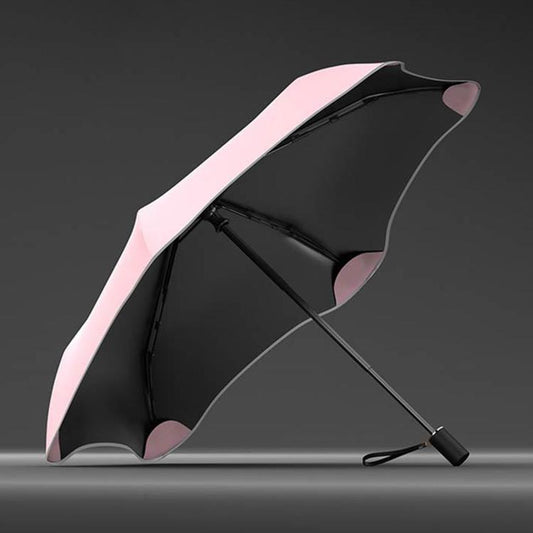 Three-fold manual sun umbrella, pink-and-black canopy with curved panels and hand strap