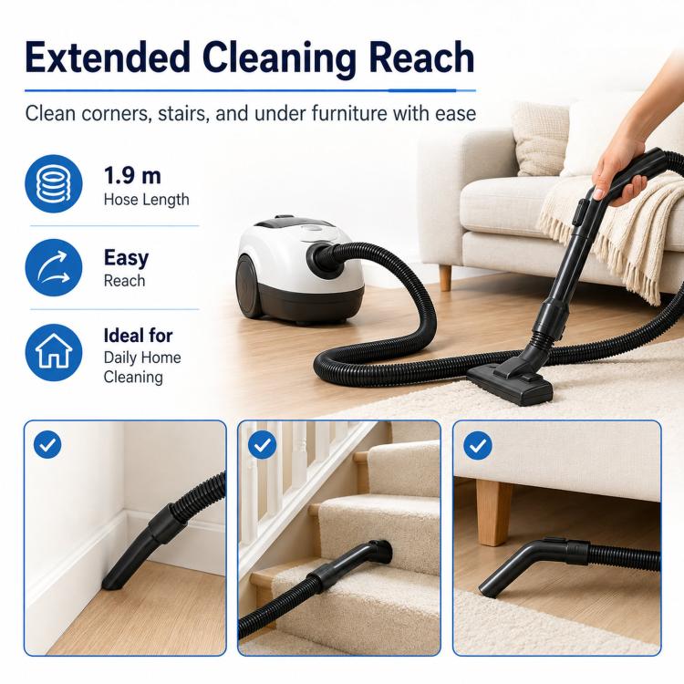 Black vacuum hose handle and coiled hose with floor nozzle attachment