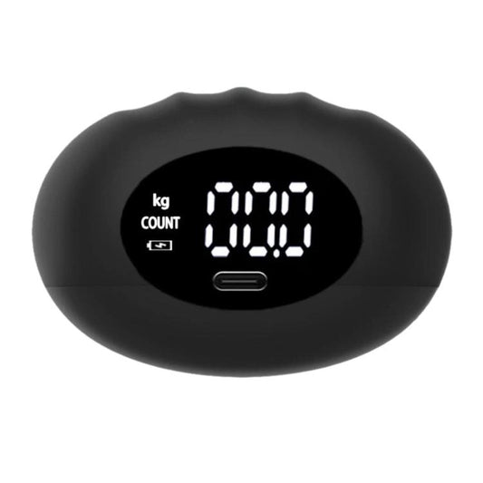Black digital hand dynamometer with LCD screen showing kg count and charging port
