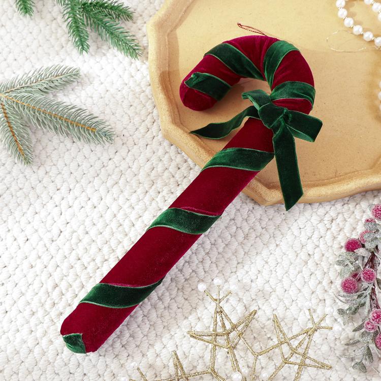Velvet candy cane ornament with red velvet body and dark green striped ribbon, hanging loop