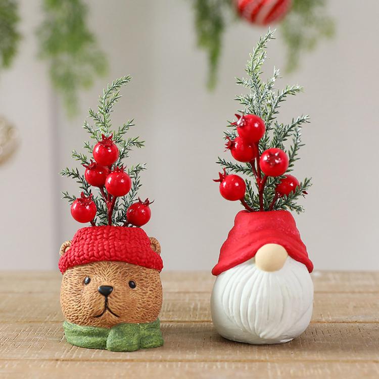 Bear and Santa Christmas gnome ornaments with red berry stems and evergreen