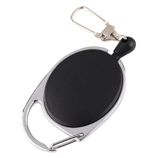 Retractable key ring holder with black oval shell and metal carabiner clip, angled view.