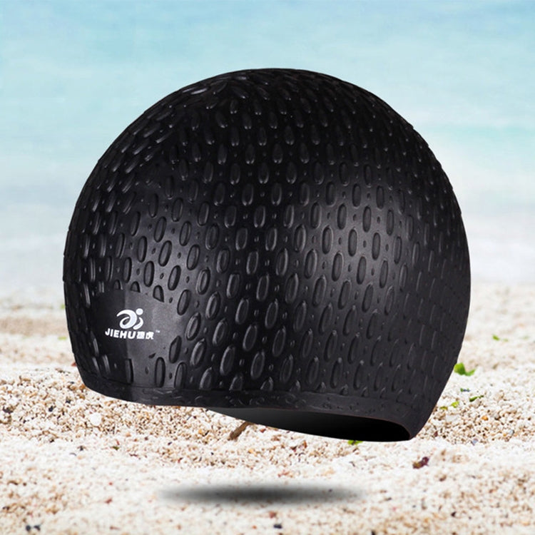 Black silicone swimming cap with water-drop textured surface and curved brim