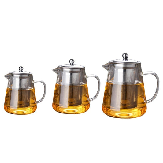 Set of glass teapots with stainless steel lids, filters, and handles; amber tea