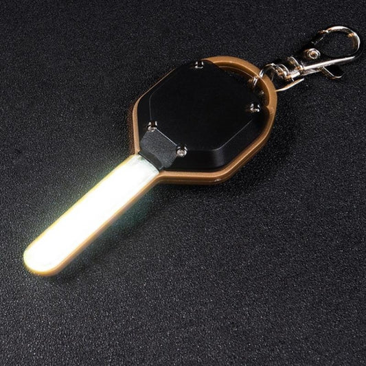 LED mini keychain flashlight with white beam, black and bronze body, metal keyring