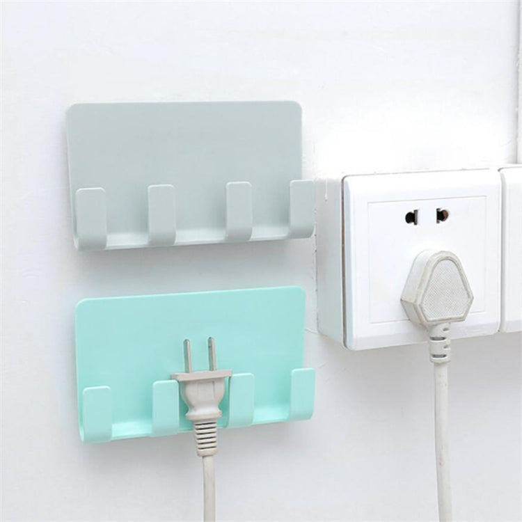 Mint and white wall charging holder set with phone slots and outlet cable mount