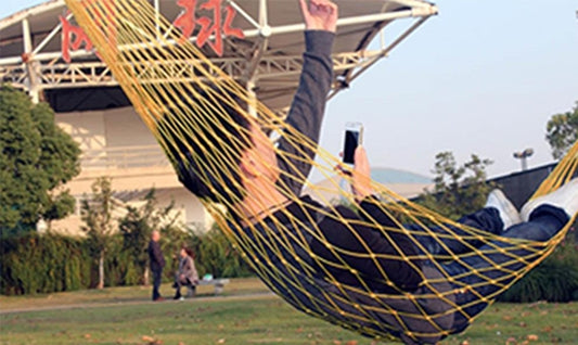 Outdoor color mesh hammock with orange and dark blue rope net