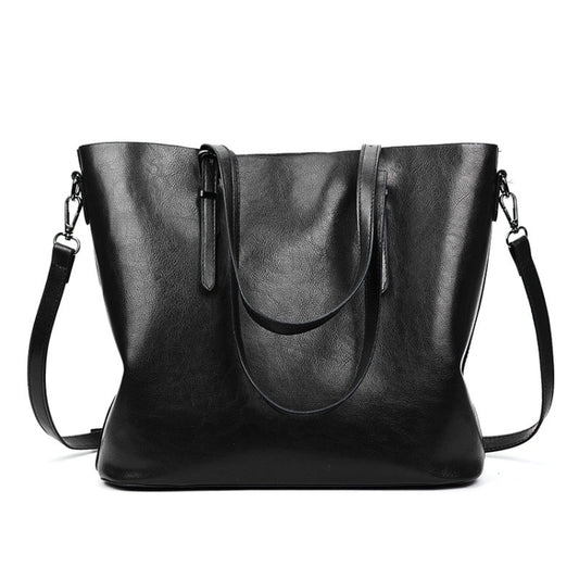 Black PU shoulder tote with dual top handles and adjustable crossbody strap
