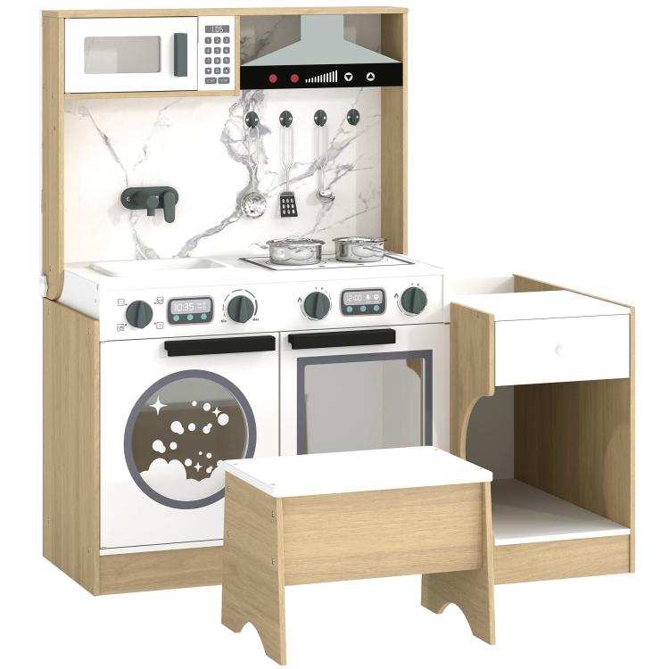 Kids play kitchen set with white stove, sink, marble-look backsplash, and accessories