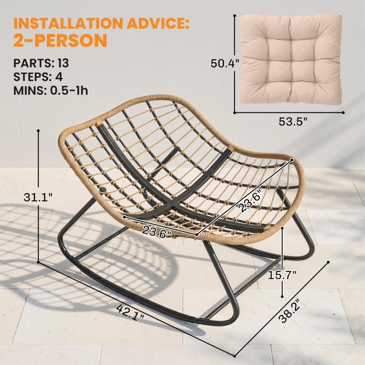 Woven rattan rocking papasan chair with cream cushion and arched metal frame