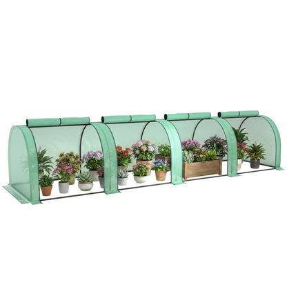 Green tunnel greenhouse with arched frame and zippered door panels