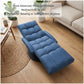 Blue zero-gravity style floor recliner with padded footrest and reclined seat