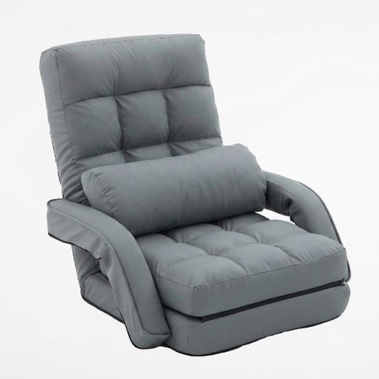 Grey padded folding lounge chair with tall backrest and armrests, includes seat cushion