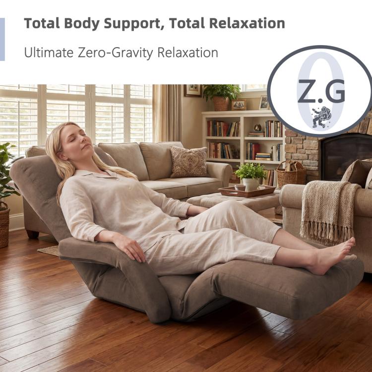 Brown zero-gravity reclining floor chair with padded backrest and foot section