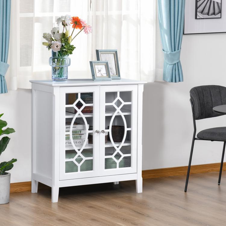 White cabinet with two framed glass doors featuring decorative geometric pattern openings