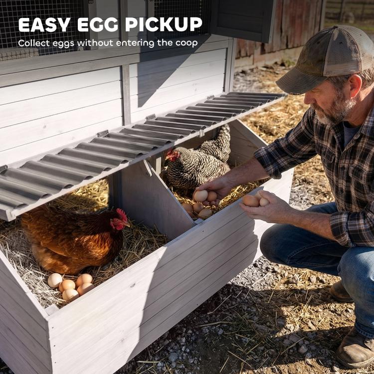 Gray wooden chicken coop with egg access from nesting box and roof panel