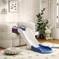 Blue and white toddler slide on the floor, with car-themed end supports