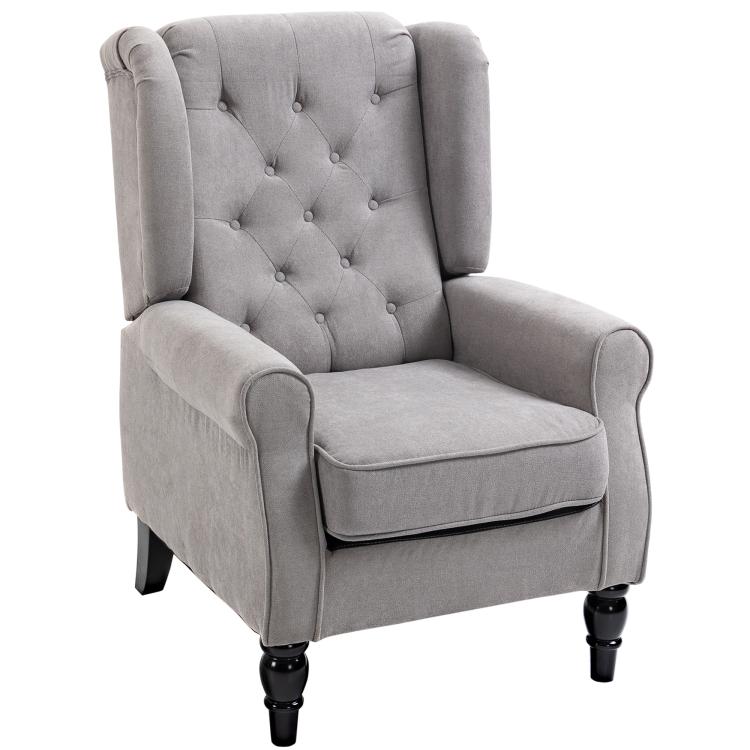 Gray wingback accent chair with button-tufted back, rolled arms, and turned legs.