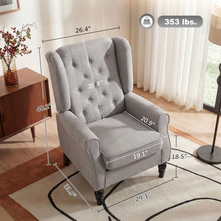 Gray wingback chair with button-tufted back and rolled arms, with black turned legs.