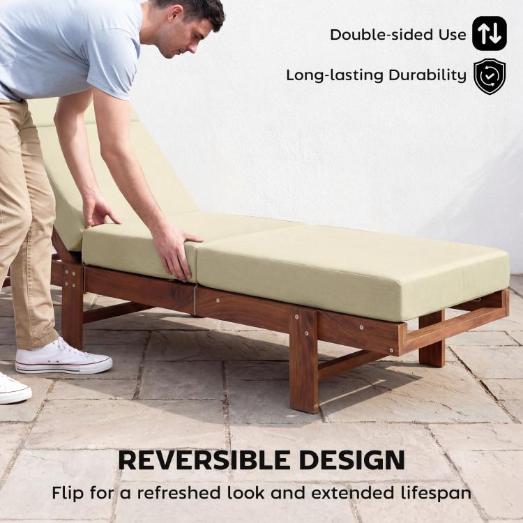 Cream outdoor chaise lounge cushion with attached ties, being adjusted