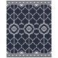 Reversible outdoor rug with navy and white lattice, diamond medallion pattern