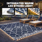 Patio set with outdoor rug featuring integrated warm LED border and white geometric pattern