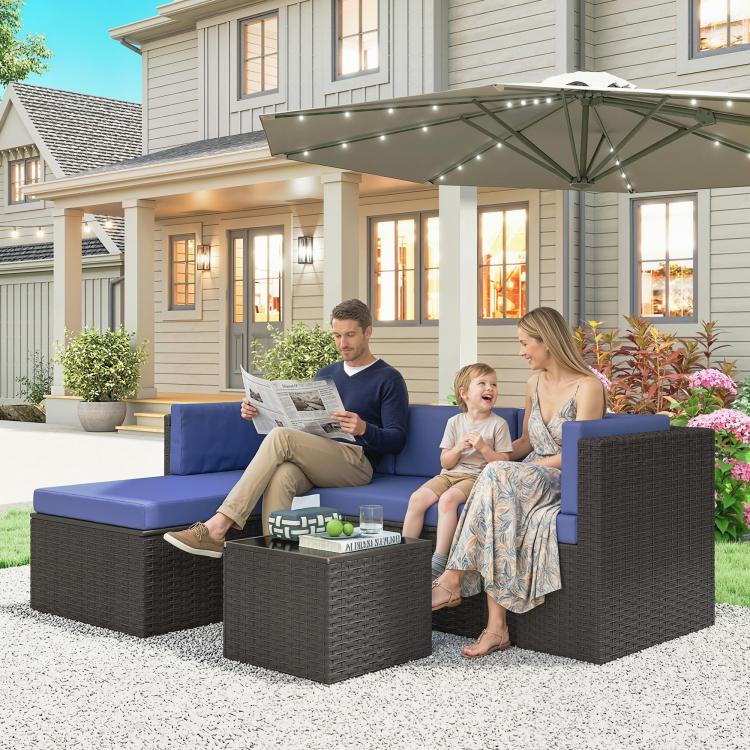 3-piece dark wicker patio conversation set with navy cushions and glass-top table