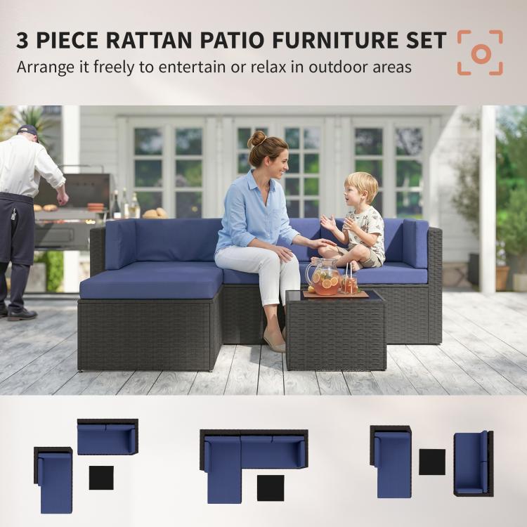 Outdoor rattan-style patio furniture set with navy cushions in 3-piece configuration