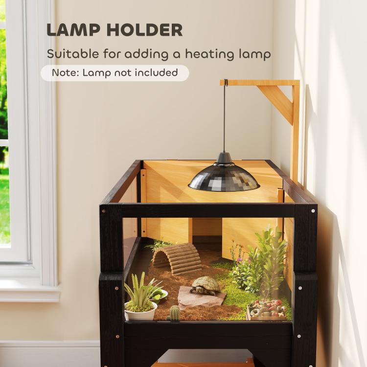 Wooden tortoise habitat with lamp holder above inner enclosure