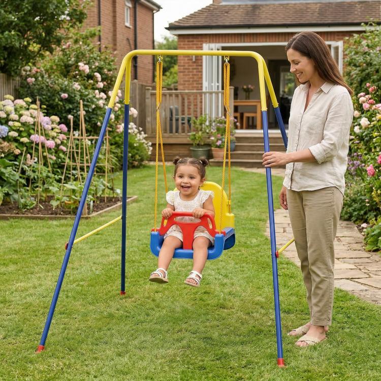 Toddlers’ blue-and-yellow swing set with red seat and hanging ropes in an outdoor yard