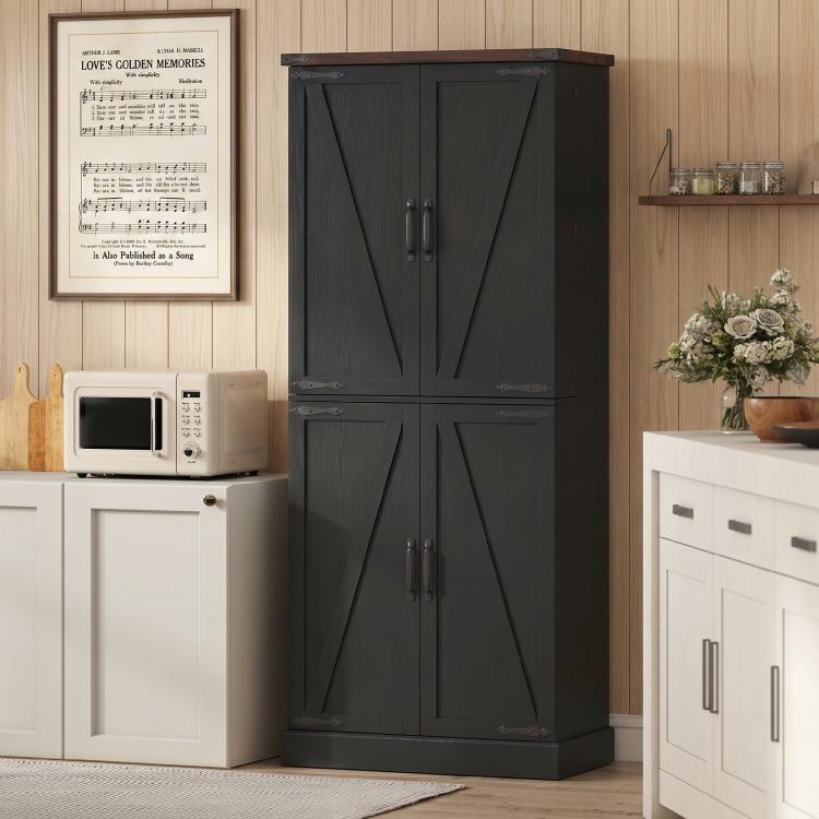 Black tall pantry cabinet with double barn doors and metal handle hardware