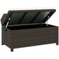 Outdoor wicker storage bench with open lid, dark brown frame, light cream cushion on top