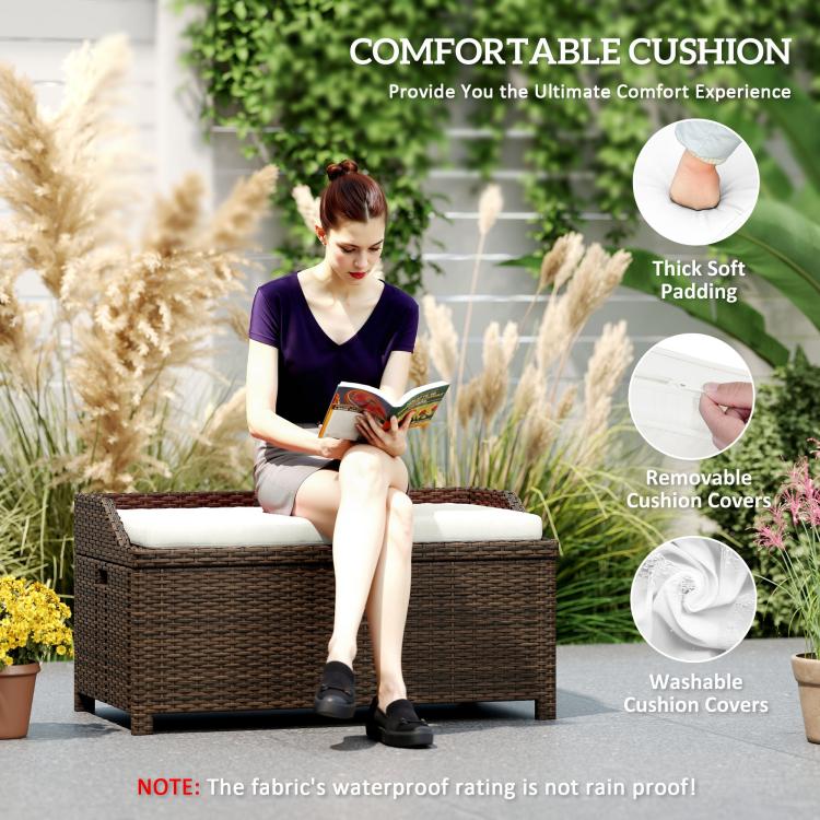 Outdoor wicker storage bench with cream cushion, dark brown woven sides, person seated