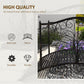 Dark bronze arched metal garden bridge with scroll side rails and slatted walking surface.