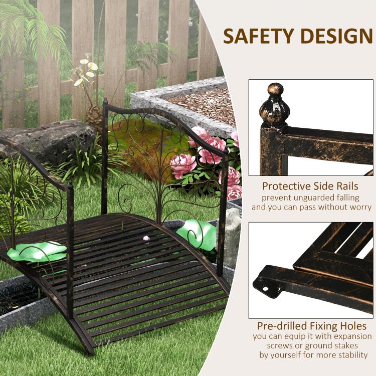 Dark bronze arched garden bridge featuring protective side rails and slatted deck.