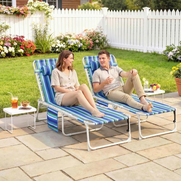 Blue striped folding outdoor chaise lounge chairs with adjustable recline, two-person view