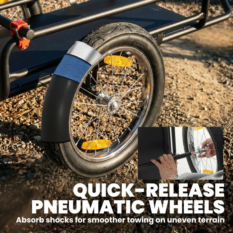 Pneumatic front wheel with shock-absorbing tire on black bike trailer frame