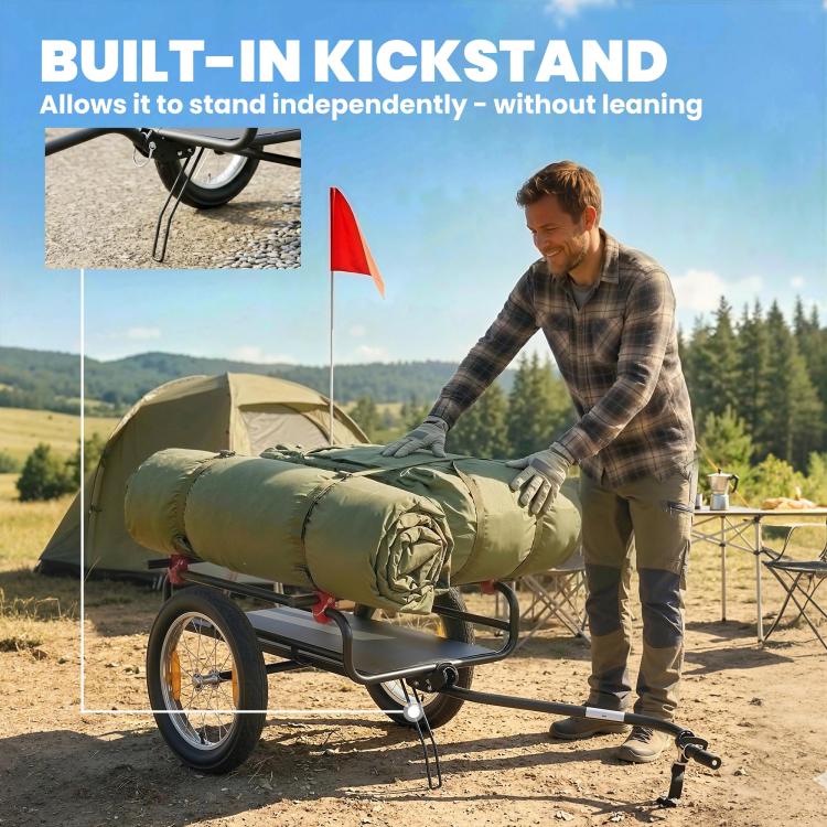 Bike cargo trailer with integrated kickstand and black bed, rolling on two wheels