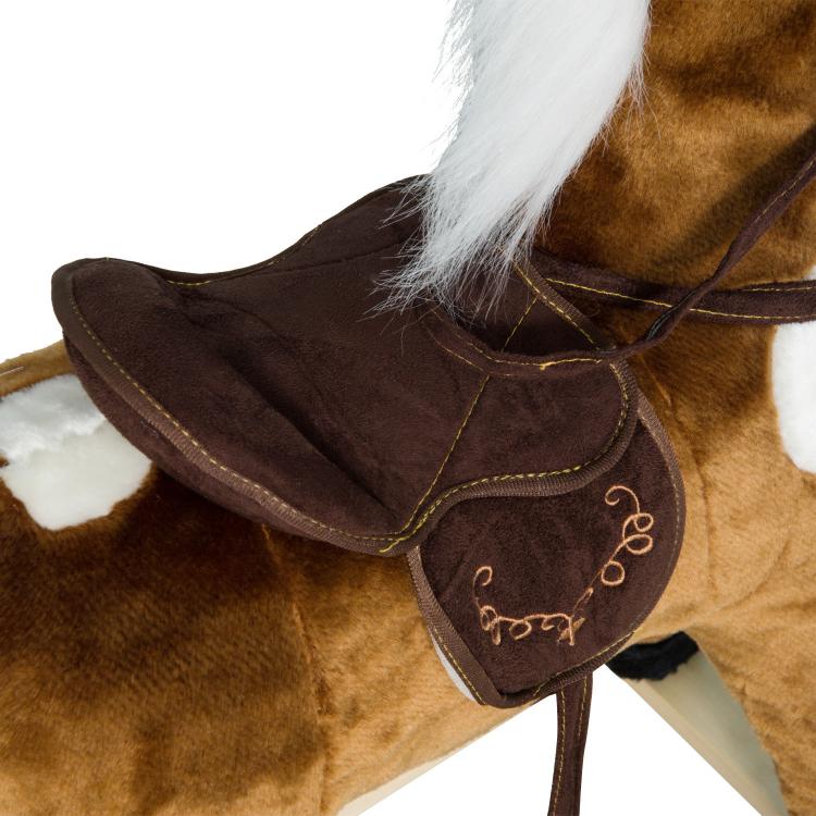 Dark brown plush rocking horse saddle with stitched design and rope harness