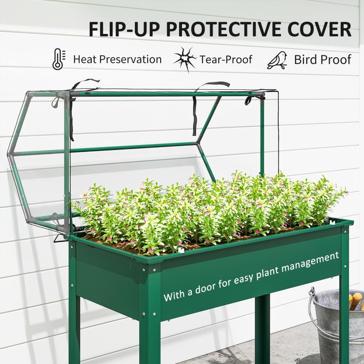 Green raised garden bed greenhouse with front door and clear protective cover