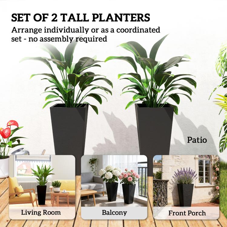 Set of 2 tall black planters with leafy plants for outdoor patio use