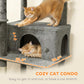 Dark gray top platform and enclosed condo on a cat tree with two cats