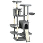 Dark gray multi-level cat tower with condos, platforms, and sisal scratching posts
