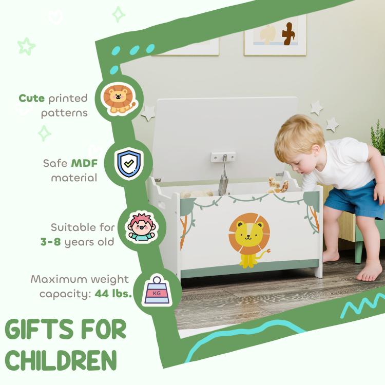 Kids toy storage chest with lion front graphic and open lid beside toddler