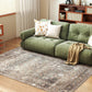 Traditional area rug with distressed gray and tan motif pattern, rectangular on wood floor