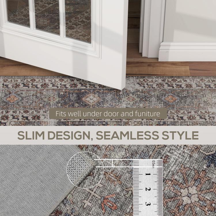 Slim, flat rug edge with measuring ruler on distressed gray and brown pattern