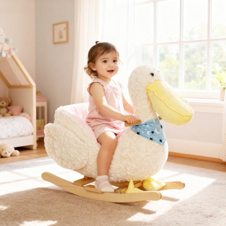 White plush duck rocking horse with pink seat and blue star bib, duck head and rockers